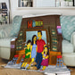 Custom Simpsons-style portrait printed on soft fleece blanket draped over a couch